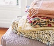 Thumb_quilts-piled_300