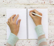 Thumb_1000-woman-writing-in-journal